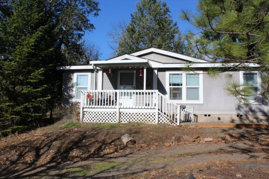 Estate sale. 5-Acres next to City limits of Shady Cove. Home is on foundation. Vaulted ceiling, detached garage. 5-Acres is mostly usable, has Rogue River frontage across Highway. Unique property, city sewer, adjacent to city. Won't last long at this price.