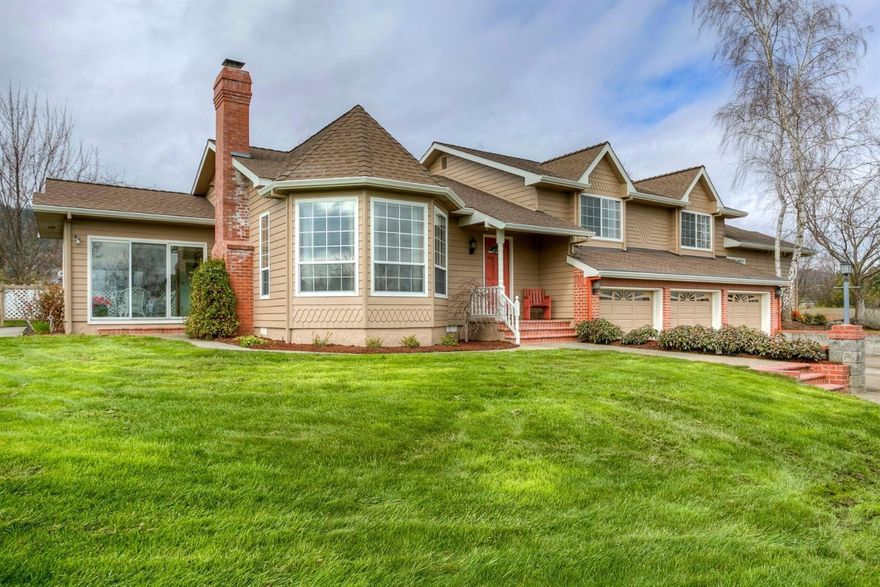 Here's what the owners say they love about this property: the scenery, the hills and the city lights.'' Plus, it's quiet here. Nobody ever bothers us. We really enjoy the privacy!'' This 6+ acre country estate is located just 3 minutes from downtown Jacksonville, but provides a comfortable and quiet country feel. Inside this tri-level home find beautiful oak floors, skylights and interesting lines. Unique features include a detached 24x36 foot shop, plus a guest suite with kitchenette attached to the house. The sunroom right off the kitchen and dining room provides protected views of the changing scenery and weather. This is a Gardeners Paradise' with two wells providing 15 gpm combined. Kitchen has newer appliances and oak cupboards. Vaulted ceilings, fireplace and plenty of windows ensure plenty of natural light comes inside. Attached 3-car garage includes epoxy floors and much built-in storage. Come see why they fell in love!