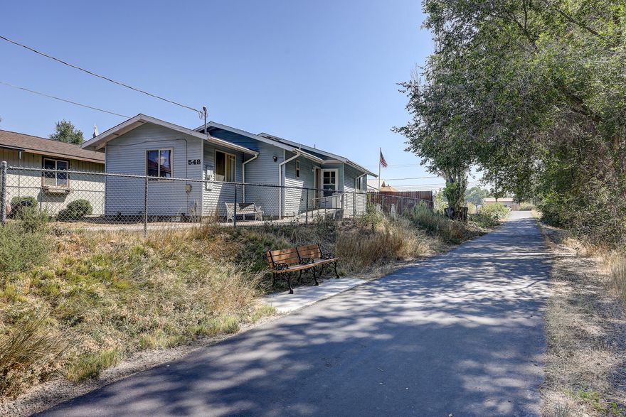 End of road in an established neighborhood next to walking/bikes paths, Ochoco Creek and downtown. Great price point for a stick built home with a fully fenced yard. Storage building, cabinets and a workbench with some room for entertaining. Light and bright you don't want to miss out on this great opportunity!