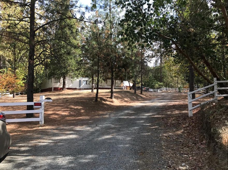 OWC... Located in the heart of Jerome Prairie this 2 acre Country property makes a perfect building site, is minutes to town! One can live in the single wide, while building your Dream Home. Value is in the land, well produces 4 GPM, clean septic report on file, plus rental income of $500. p/month on ADU. Property is fenced & cross fenced for horses, three stall barn, with concrete feed storage. Mobile is neat and tidy and worth making a trip out to see. New Appraisal for $237K on file.