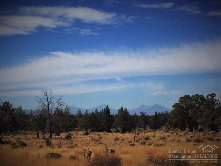 Build your Dream Home HERE! 5 acres of Powell Butte property w/ amazing views of the Cascade Mountain Range, Smith Rock & the Ochocos. Private setting nestled in between farm land & pastures with old growth Junipers. New driveway access in progress. Viewed by appointment only. Power nearby, septic feasibility already approved!