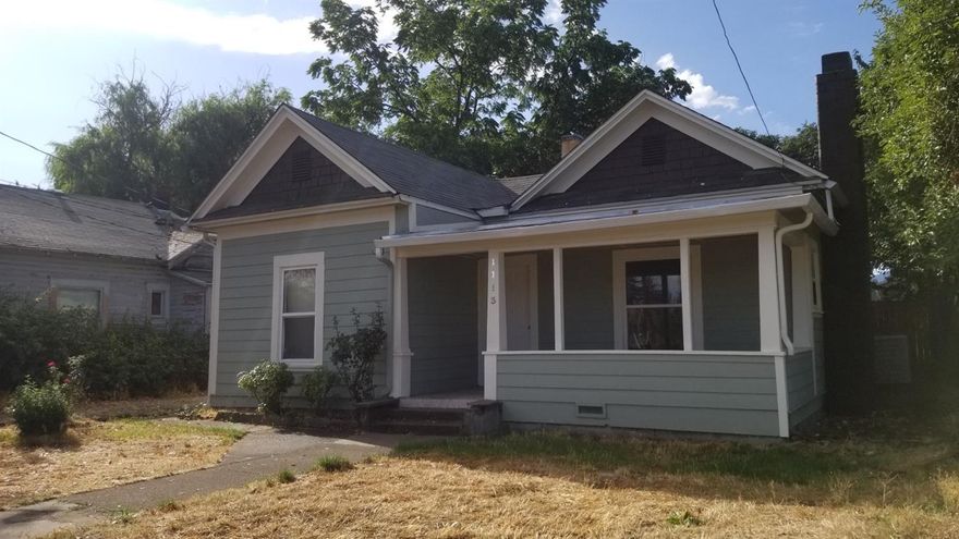 Cute cottage with great covered front porch and much to offer. High ceilings with several built-ins and cozy fireplace. The rooms are large, kitchen and bath are updated, and there is a large pantry. New paint and flooring throughout. Tile bath surround in the ample bathroom. Nice deck, private fenced back yard, and detached garage.