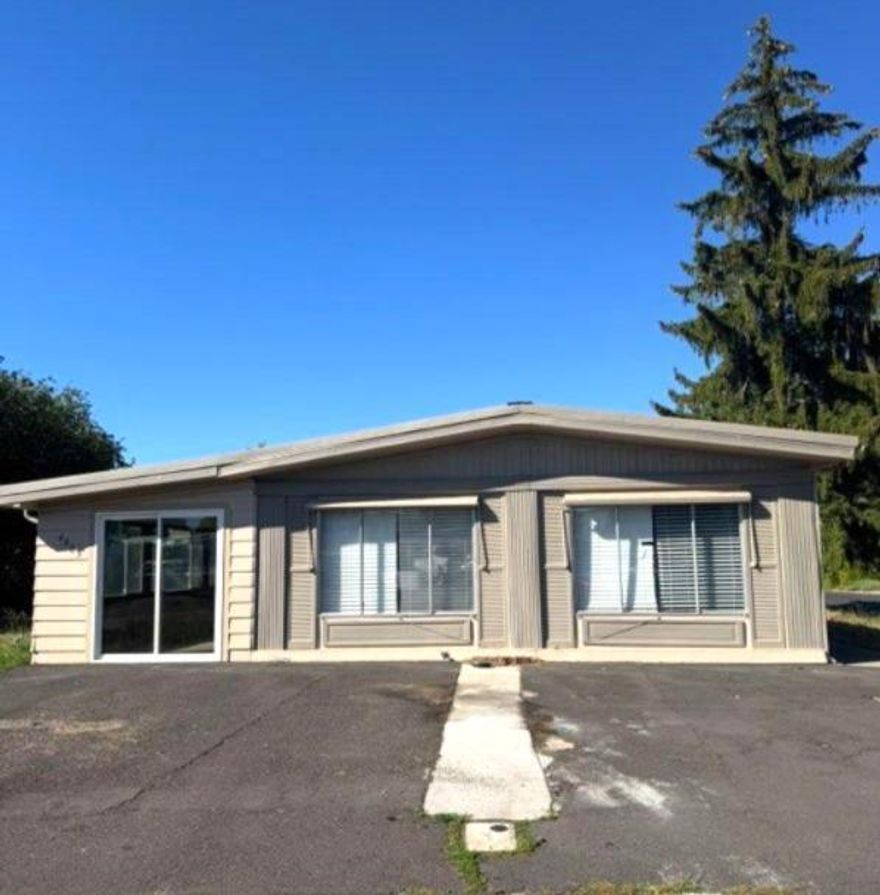 Two lots! Home-lot 800 and Garage-lot 700. Garage is 672 sq ft., Home is 1344 sq ft and a 540 sq ft enclosed front Porch. The home has a Large Living Room/Dining Room, Den off of the Kitchen, Walk in Closet in the Primary Bedroom, Newer Walk-in Tile Shower, New Laminate Floor, Double Sinks, Laundry Room, Kitchen has newer Dishwasher, Oven, and Refrigerator. A/C and Electric FA Furnace, Metal Roof on the home. Garage has a new roof, Cement floor and work shelves. New Storm door on the enclosed Porch. Seller is  an Oregon Licensed Broker and owner of this property.