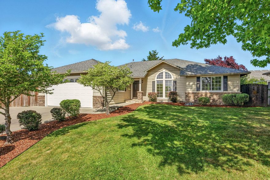 Seller is offering a $10,000. credit toward Buyer's closing costs PLUS a Home Warranty!  Welcome to this beautifully appointed 3-bedroom, 2-bath contemporary home offering 1584 s/f of thoughtfully designed living space. Located in a desirable neighborhood within District 7 Schools, this home features a split floorplan perfect for privacy and functionality.  Step inside to discover new luxury laminate flooring, a freshly painted interior, and an open-concept layout that creates a warm, inviting atmosphere.  The spacious living area flows seamlessly into the dining and kitchen spaces, ideal for both daily living and entertaining.  Enjoy the landscaped yard with patio, and 2-car attached garage. Just a short walk to the park & minutes from shopping, dining & hospital, this home offers both comfort and accessibility.  Whether you're looking to settle down or simplify your lifestyle, this move-in ready home combines style, location, and value in one perfect package.