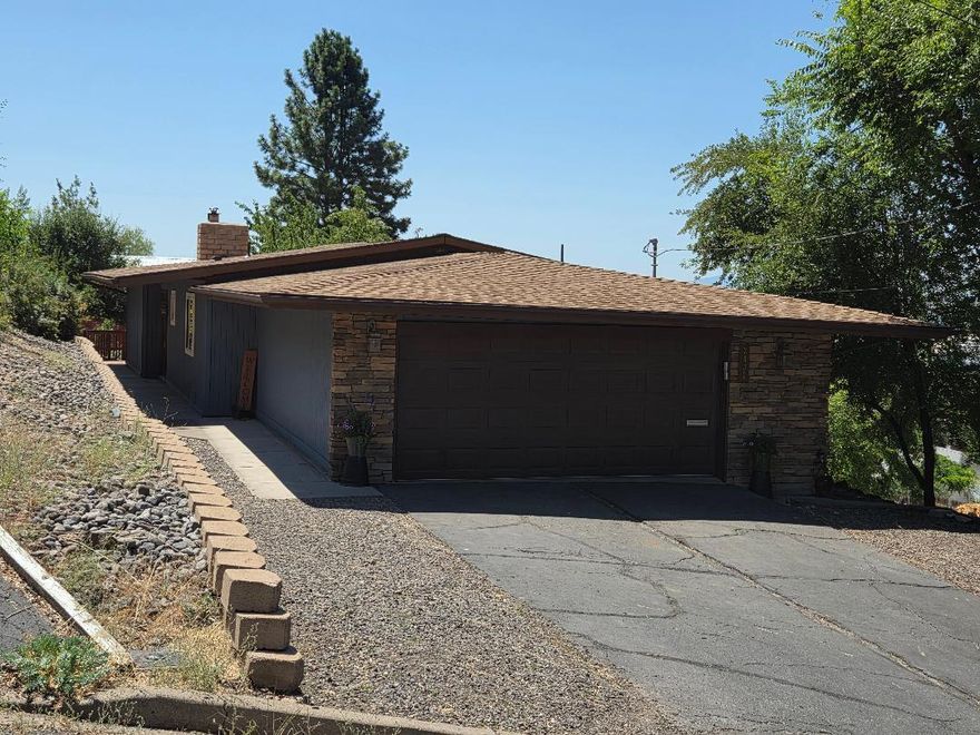 This 2 bedroom, almost 1500 sq ft home has an awesome view of the Klamath Falls City with Mt Shasta in the back ground from the covered back deck. This delightful home is 2 bedrooms, 2 baths with an open floor plan. The updated kitchen has granite counter tops and an island. The windows are updated to vinyl double pane and there is a certified wood insert in the fireplace. Tile, carpet and laminate floor go throughout the home to give it a rich feel. There is a nice storage/work shed on the additional lot and the low maintenance yard is easy to take care of. There is potential access to geothermal heat. All of the plumbing is still there. There is a home warranty include with this home and even the home inspection has been done so there will be no worries.