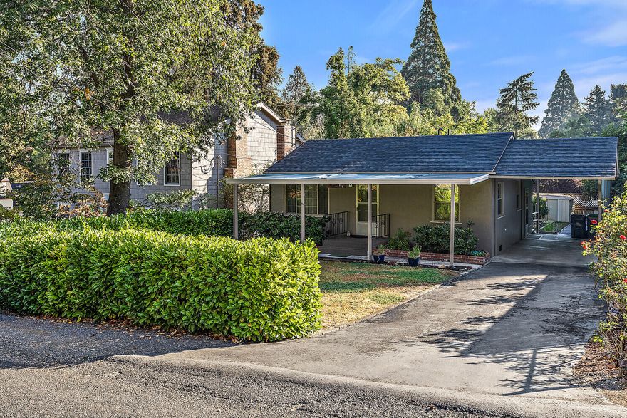 Nicely maintained cottage style home located in Old E. Medford. This 2 bedroom/1.0 home has lots of updates which include; newer composition shingle roof, newer vinyl windows, newer gas HVAC system and more. Interior features include: living room F-P, open kitchen and dining area with lots of windows and natural light, carpet, vinyl, tile and T&G Fir wood floors. Continuing the downstairs you will find a spacious 600 square foot workshop with work benches and lots of storage cabinets, great for the handyman. This daylight basement area also has a laundry area with utility sink and outside access too. There's a large covered front entry porch, open wood deck at the rear of the home overlooking a gorgeous rear yard area with irrigated raised flower beds and garden boxes, perfect for the green thumb enthusiast. Lots of parking with an attached carport, asphalt driveway and RV parking. This home is move in ready and waiting for it's new owner. Call LA to schedule an appointment.