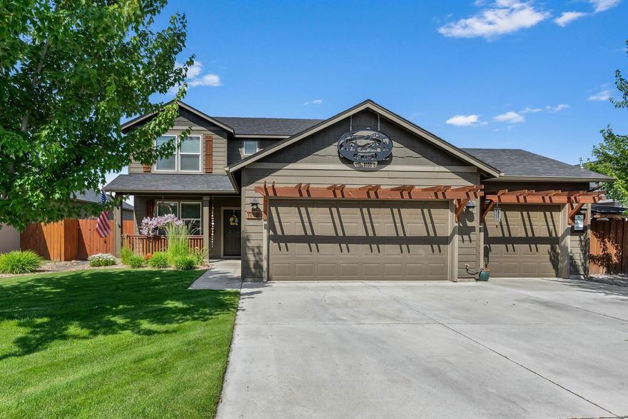 Don't miss this impeccably maintained home in NW Redmond ½ mile from West Canyon Rim Park. This home has it all; curb appeal, well thought out spaces, craftsmanship & thoughtful design throughout. Great room plan w/an abundance of natural light, hardwood floors, & cozy stone surround gas fp w/mantle. Open kitchen ftrs island w/brkfst bar seating, spacious dining area w/sliding doors to patio, an abundance of cabinetry & counter space! Primary suite ftrs striking accent wall, massive walk-in closet, dual sinks in bath, soaking tub, & step-in shower. 2 addtnl bedrooms share a full bath + laundry room w/built-in shelving. 4th bedroom or office space downstairs has access to a full bath on the main. Your fully fenced backyard oasis ftrs a covered patio w/pergola & entertainment space. Gorgeous landscaping ftrs sprinklers in front/rear plus a thoughtfully designed garden area that offers space for flowers, herbs, or veggies. Storage shed w/paver patio surround, triple car garage + more!