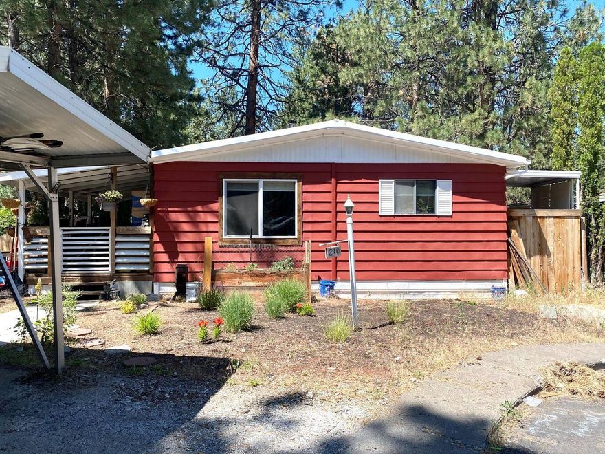 Updated double wide, 2 bed, 1 bath home with many updates including new energy efficient, double pane windows, A/C and heat pump, vinyl flooring throughout, bathroom vanity, stainless steel appliances, light fixtures and more. This home is vacant and ready for its new owner. Fenced back yard with private deck. Amenities include an indoor pool, gym, clubhouse. 
$1,033.52 monthly space rent includes water, garbage, sewer, snow removal and clubhouse with use of pool. Owner occupy only. Sublease not allowed in park. Park approval required, contact LA for park manager.