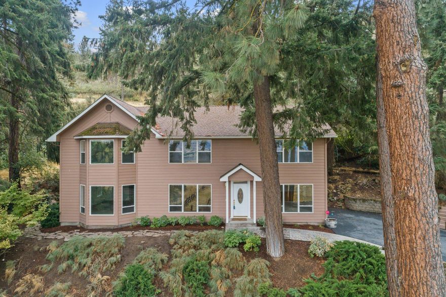 This 3,638 Sq. Ft.  home is a lake view dream oasis!  Completely remodeled in 2000 with 5 bedrooms and 4 full baths, this spectacular home accentuates the surrounding natural beauty with an expansive outdoor deck and large windows throughout, letting you soak in the natural beauty and sunlight with great views overlooking Klamath Lake.  The spacious open floor plan has many great features including a cozy gas fireplace, an open style kitchen featuring a large island with a gas cook top and double oven, and custom cabinetry throughout the home.  Upstairs are five bedrooms, with the stunning master bedroom having vaulted ceilings, a seating area with breathtaking lake views, and a master bath with two walk-in closets, jacuzzi tub, and separate shower.  Located on roughly 1.8 acres of forested hillside with an additional 2.5 acres of fenced pasture, this unique gem is a must see.  Tour today!