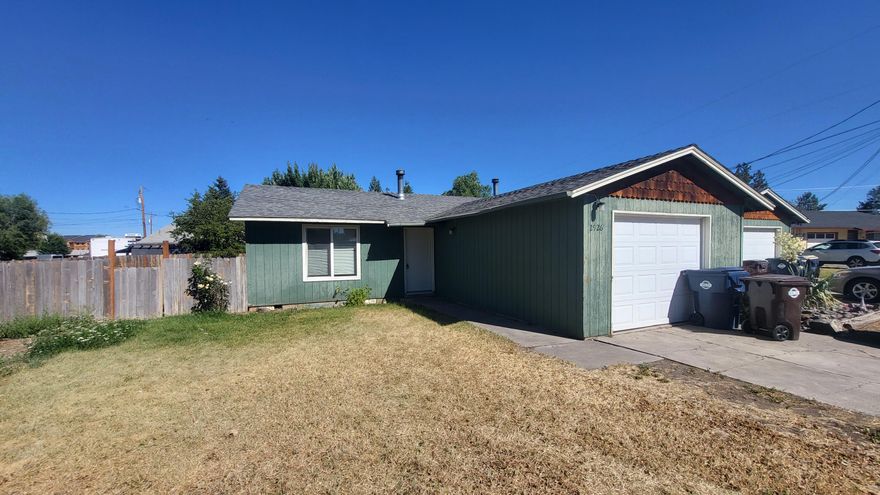 Investment opportunity awaits.  Single level duplex with fenced back yards.  One side comprised of 3 bed 1 bath and the other 2 bed 1 bath both with single care garage and great parking.