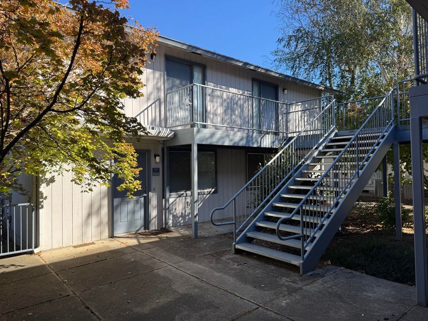 The subject property consists of an 8-unit guest housing complex and meeting/community room located on Spring Street, adjacent to the Providence Medford Medical Center campus. The dwelling units are basic, each with an entry room, a bedroom, and a bathroom. There are no kitchens or other amenities that are common in normal apartment units. The total property size is approximately 0.19 Acres, and total improved building square footage is approximately 4,824 SF per Country Assessors data. There are two separate 2-story buildings containing 4 units apiece, with a shared central courtyard/ common area. The Southernmost apartment building is connected to the meeting/community room. The buildings were built in 1979. Seller does not have any information on the condition of the building systems. There was a water leak in one of the dwelling units that caused damage which is currently unrepaired. Buyer to do its own due diligence in regard to the property condition.