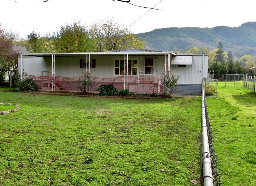 Very clean well maintained 0.42 acre lot. Plenty of space for RV parking. Nice little shop on property along with carport/canopy for storage. Back of property is fenced all the way around. Very private lot in a quiet area with mountain views. Divide and build or occupy and enjoy!