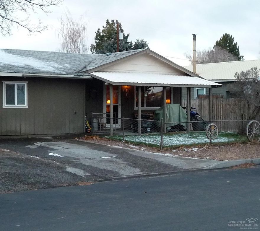 Adorable! 3 bedrooms, 1 bath updated home in the heart of Redmond. Don't miss out on this opportunity! Fenced yard, covered porch, laminate flooring, tile and an added bonus room currently being used as the master bedroom makes this house a must see. Close to shopping and entertainment will make this property very desirable. Be sure to add this property to your favorites and schedule a showing today!