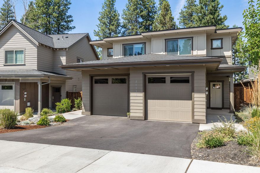 This duplex features 3 bedrooms and 2½ baths per side over looking the canal. Upgraded finishes throughout the home include: Quartz counter tops, back splash, stainless steel refrigerator & dishwasher, waterproof plank flooring, gas fireplaces and high efficiency ductless heat pumps with air conditioning. The fenced yards features a concrete patio area, enclosed storage, landscaping in front and hardscaping in the backyard. Attached garages with automatic openers. Great turn key investment opportunity with professional property management available. Contact for performa.