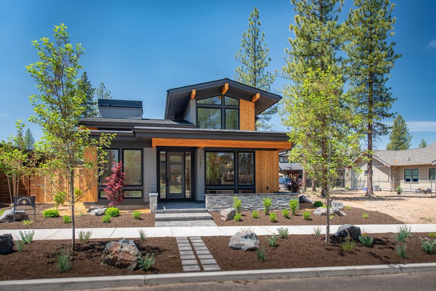 Gorgeous Mid Century Modern home in NW Bend with easy access to trails, schools, shops and more. Discovery West is one of the hottest neighborhoods on the westside of Bend. This 2237 SF home is under construction and will be done in late May 2023. The primary bedroom and office are on the main floor with two more bedrooms, a full bath and some loft space upstairs. The great room design has a beautiful kitchen with a huge center island and lots of storage space. Enjoy your outdoor living in the west facing courtyard, Yard will be fenced and landscaped. Perfect for enjoying those summer afternoon/evenings. The two car garage is in back of the home, with alley access. This another fabulous home build by Heritage Homes NW which means outstanding quality with the finishes, design and construction. See the attached information on what selections have been made so far. Still time for some of you own personal touches, come see it today and be living in this beautiful home by summer!