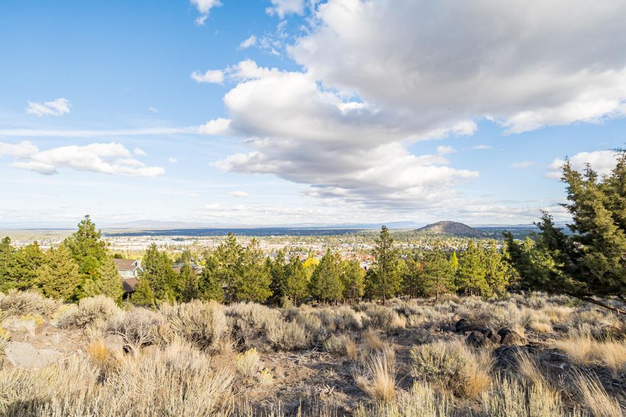 Expansive territorial views from Smith Rock, Powell Butte, Pilot Butte and the City of Bend from this .79 acre Awbrey Butte building site located on Bend's Westside.  Gently sloping lot with Northern and Easterly exposures is perfect to construct the home of your dreams.  Conveniently located at the end of Wyeth Place this lot offers privacy and breath taking views and only minutes to shopping, restaurants, schools, parks and more. Utilities at the street. Bring your builder and imagine the possibilities.
