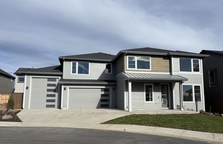 Welcome to this fabulous home, which features an RV garage, a 2-car garage!
It also has a large covered patio, and open-concept living with an 0ffice/bedroom and a full bathroom on the main floor.  Upstairs you will find 4 additional bedrooms, including a sizeable primary suite with a large walk-in closet and generous floor-to-ceiling tiled shower. There is also a large loft/bonus area and a full laundry room with a sink and cabinets for storage.  All of the homes Stone Bridge Homes NW built are Earth Advantage certified and include a landscaped front and back yard, fencing, a Ring doorbell, a Nest thermostat, a 220-volt plug for an electric car, and air conditioning. You have everything you need to make it the perfect home.

Stevens Ranch features parks, caves, walking paths, nearby shopping and restaurants, and the new Bend library