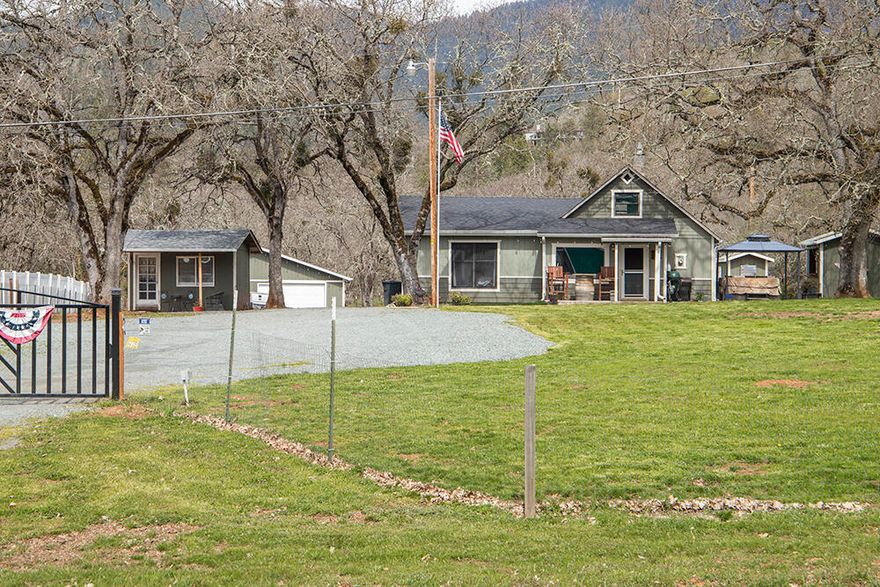 Completely Renovated Cottage Style Farmhouse w/ (3 bay) Garage, Shop, Storage Building plus Separate Finished Office Space, RV Parking, Outdoor Bar, Hot Tub, Trex deck/Patio & Above Ground Pool on 2.3 Beautiful Usable Fenced & Gated Acres just minutes from Town w/ easy access to I5. 2 Bedrooms w/ walk-in Closets, Large Finished & Heated Attic Upstairs Currently Used as a 3rd Bedroom. Fresh Exterior Paint, New Roof, Newer Forced Air A/C, Natural Gas: Furnace, Range/Oven & (Woodstove-Look) Heating Stove. Newer Stainless-Steel Appliances, Granite Slab Counter Tops, Laminate Wood Flooring, Dbl Pane Windows w/ Wood frames. Modern Fixtures. Lots of Extra Storage. Great Spaces for Entertaining: Outdoor Bar, Newer Hot Tub & Above Ground Pool. Pathways & Patios. RV Dump & Parking. Home & Property is Beautiful, Well Maintained & Tidy. Landscaping incl: Photinia, Roses, Grapes. Fully Fenced, Gated & Cross-Fenced & Gated back acreage for Critters or Toys. Key Code Sec. Gate. Appt Only.