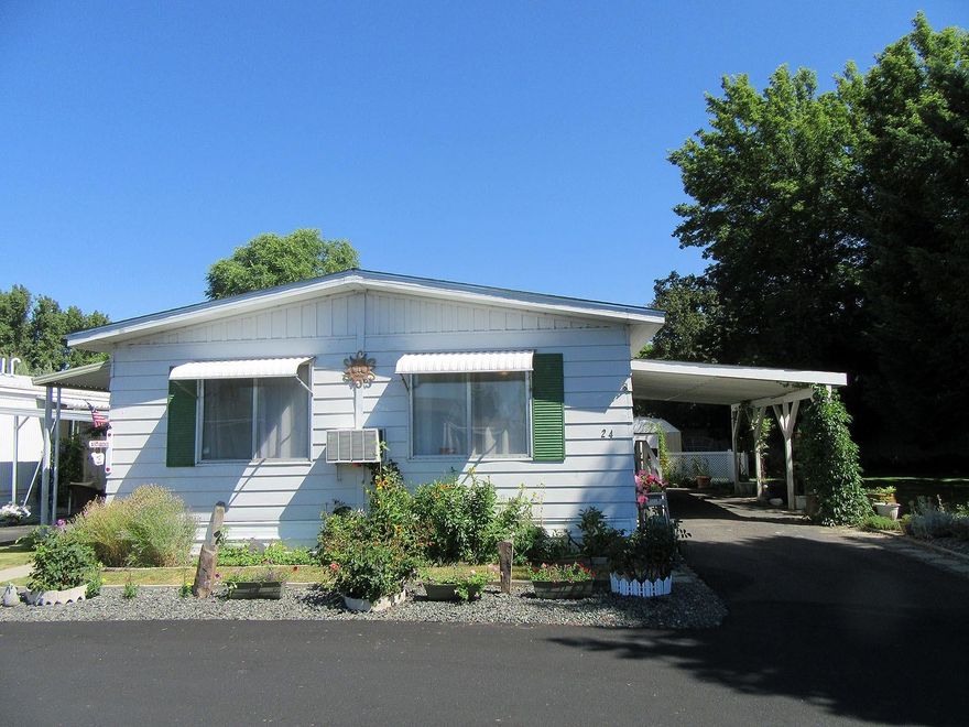 Well maintained 3 bedroom, 2 bath mobile home in 55 & older park. All appliances stay, gas heat, pellet stove,window A/C. Carport, back deck, 2 storage sheds, cool shady side yard with green grass, perennials and mature trees, even a garden spot. Park rent is $365.00 includes water, sewer,garbage and street snow removal.