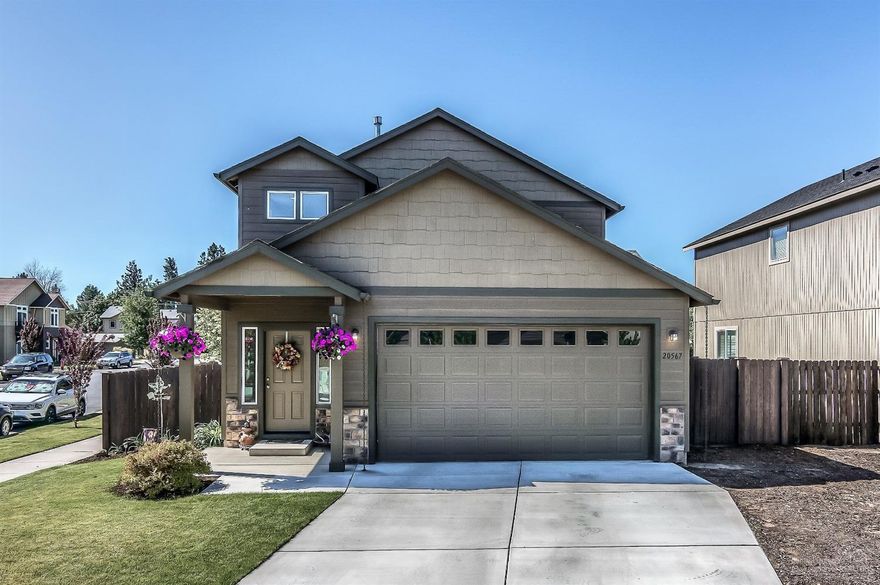 Light and bright corner lot in South Point. Located close to parks, schools and shopping. Well-maintained home. Laminate hardwood in great room, kitchen and hallway. Large great room with corner fireplace. Area on side of home to store trailer or have a nice garden. Large patio in landscape backyard with fully fenced backyard with sprinklers. A must see! Call for appointment!