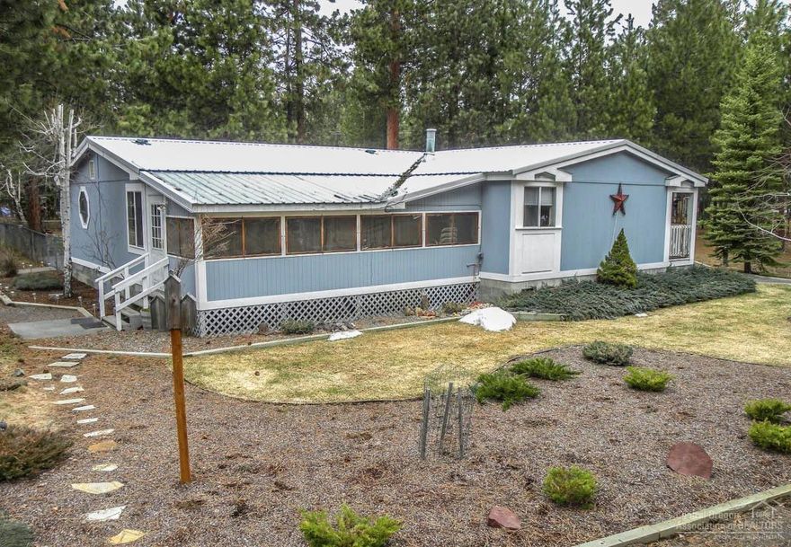 Pride of Ownership with all the extras. This home has been well cared for & is perfectly set up to accommodate all your outdoor recreation hobbies. 3 bay Garage with Carport & additional storage building attached in back, RV Storage & pole barn for more toys or add parking. Fenced yard, mature trees & landscaping, water feature, Meatal roof & plenty of room inside for all. Good floor plan, Master suite, Office, Expansive Kitchen, covered front, back decks + enclosed porch. Outdoor Paradise!