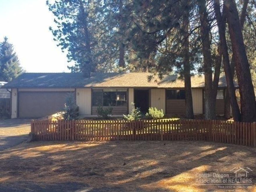 Wanting a spacious private half acre lot? or single level living? The search is over! Large living room with fireplace that can be switched to gas. Extra back room can be used as a fourth bedroom, playroom, or home office. New glass slider leads to the best backyard ever! Plenty of room for entertaining, lawn games, or build your dream shop. And a bonus, little ones will thoroughly love the play structure. Mature landscaped property in a well established neighborhood. Call it home!