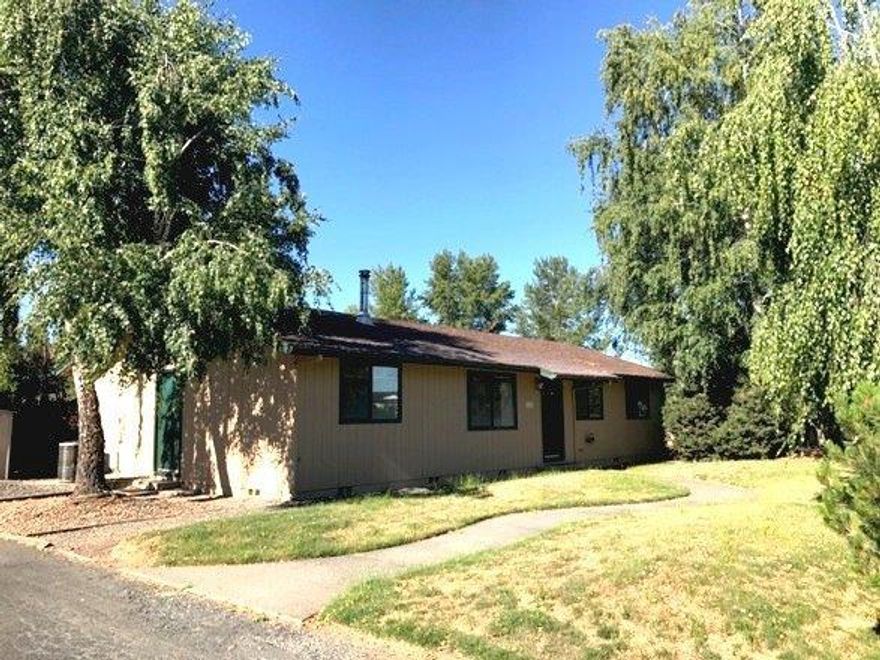 Great location in the Redwood area, just west of town...You can move right into this 1200 sq/ft home that features 3 bedrooms plus a den. Keep your costs down with a heat pump plus a woodstove. Appliances are included. No garage on site, but just the right spot to put one, if you need it. There are two storage sheds in place. Low maintenance yard will keep your landscaping costs down as well.