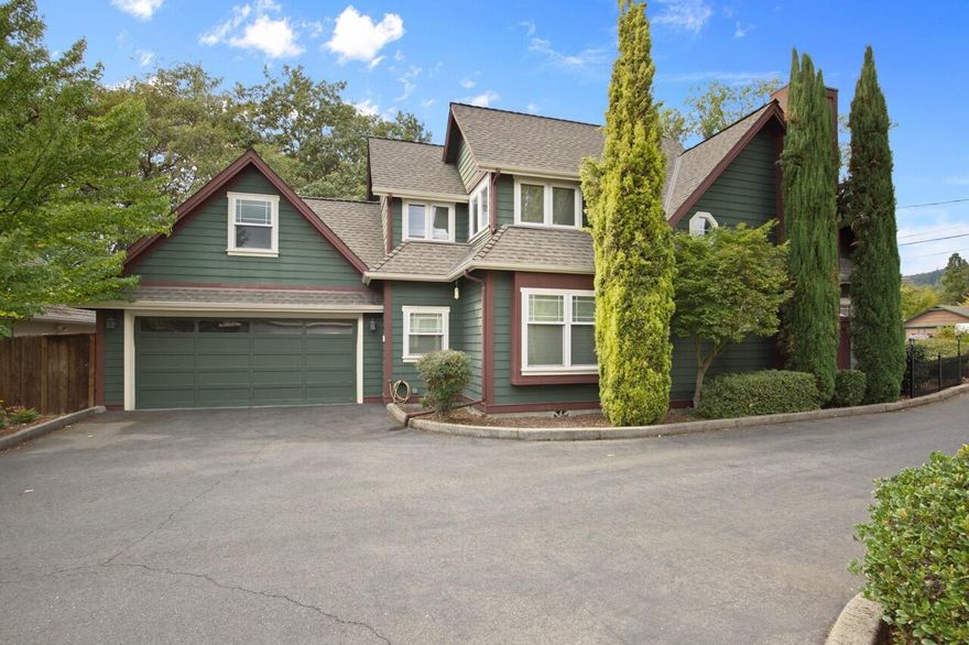 Well-maintained 3-bedroom home built in 2000 with low-maintenance landscaping, drip system, and artificial turf. Interior features include hardwood floors in the main living areas, carpet in bedrooms, cathedral ceilings, skylights, and a gas fireplace. The primary suite spans the upper level and includes a jetted tub, private balcony, and ample natural light. Double-pane windows throughout for energy efficiency. Attached 2-car garage. Fully fenced yard with wrought iron fencing in the front. Fridge and BBQ (plumbed for natural gas) are included in sale. Located near Wagner Meadows trail and one block from Westholm Park with sports courts and playground.