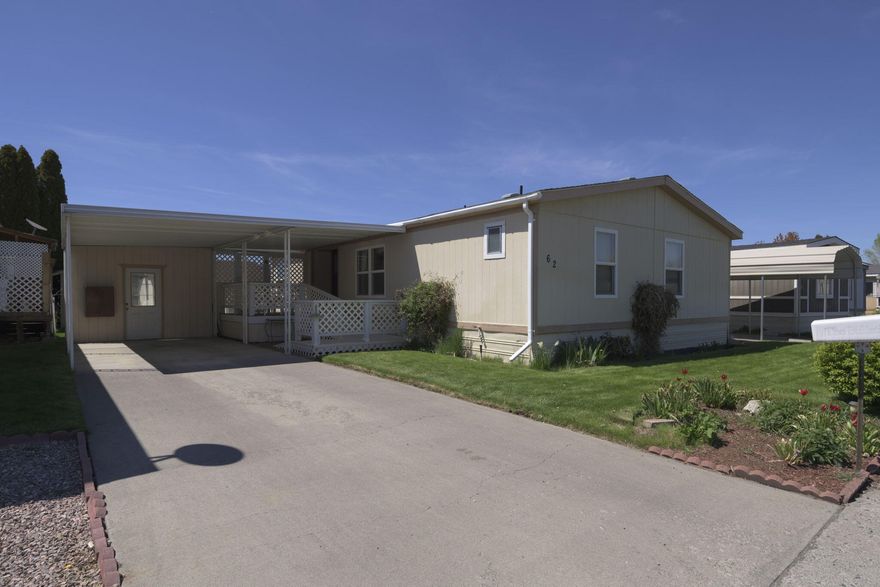 Come home to the ease of true living.  Enjoy Remington Arms Park.  The family feel!  Pull into your covered carport.  Sip your afternoon beverage on your covered porch.  As you enter you 1215 sq. ft. home you will instantly feel the warmth of an open concept.  This carefully designed 3 bed 2 bath home has a primary bedroom/bathroom that is split from the secondary bedrooms.  Stay warm in the winter and cool in the summer with your heat pump. New roof in 2017 and new furnace in 2019. This home features a separated laundry area as well as an 8ft x 8ft storage unit. Home has wheelchair ramp for the front if needed.    Your outdoor area awaits you.  Plush grass and lovely flower beds.  Bring your style and personal touches to your new home.  Home will be professionally cleaned.
This home priced to sell at $130,000
You will need to have park approval.