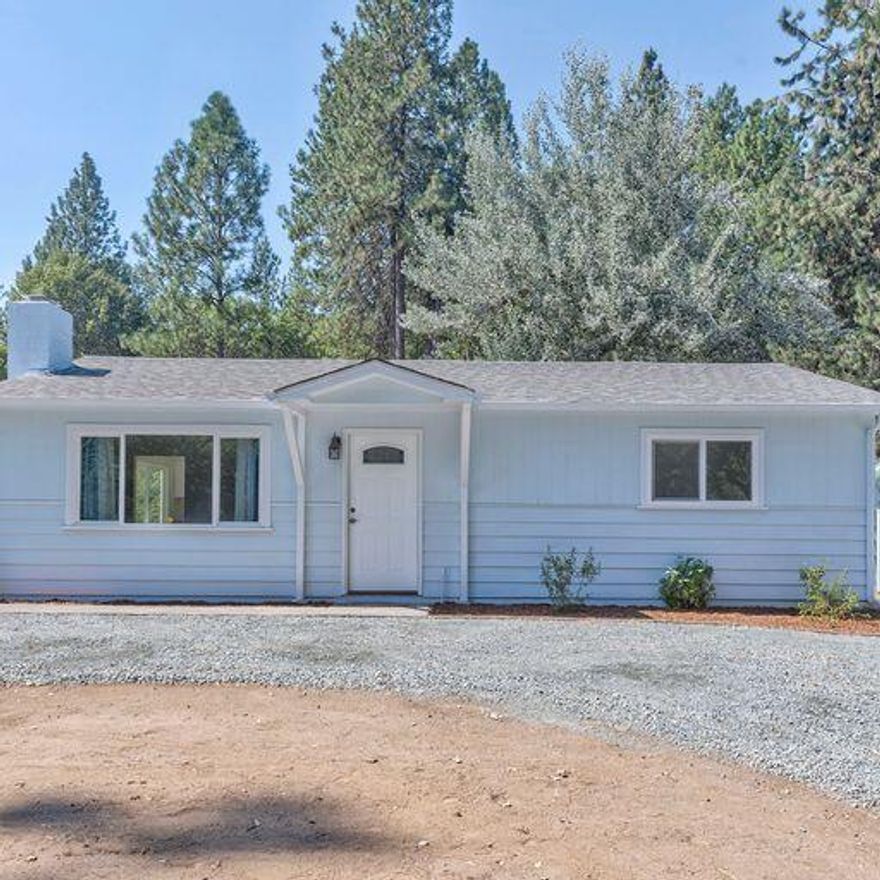 A sparkling gem! Entirely updated 2 bedroom/1 Bath cutie on .70 of an acre with fresh flooring, paint...most everything! Lovely sized living room offers ceiling fan/light, picture window, brick fireplace with electric heater insert for instant ambiance, vinyl plank flooring throughout most of home. Bright Kitchen with dining and fantastic light streams through the large window and views of the backyard. New Stainless stove and dishwasher...New Washer and Dryer... New tub/shower combo...New HVAC and Septic. TL#4400 is a .55acre with shared drain field & is spacious enough for RV parking or build a shop/garage & is being sold with this home on .15acre. Very Clean, just move in! Ready for your touches and landscape design!