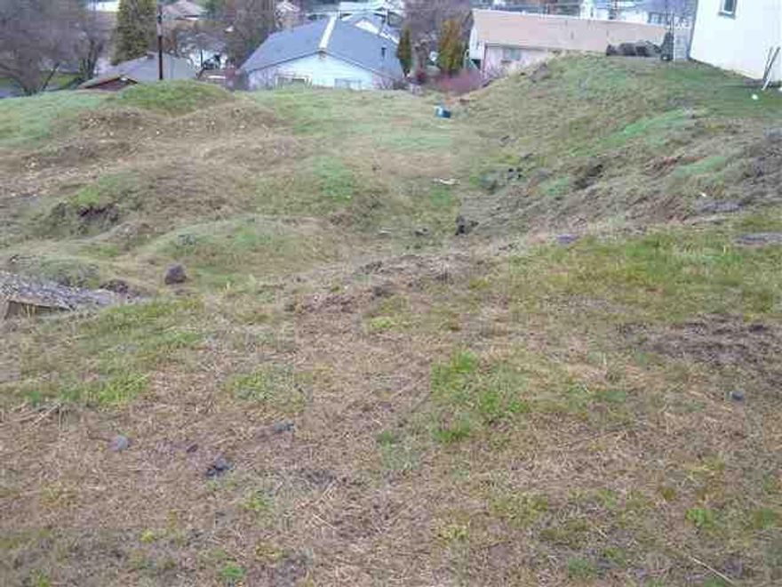 City Lots At Affordable Price On Paved City Street, Medium Density Zoning, Excellent For Multi Family, Single Family Or Manufactured Home. Seller States Sewer In Alley, Water At Street. Prior Manufactured Home Permit On Assessors Records And Property Appears To Have Been Prepped For Such. Private Lender Would Consider Financing To Acceptable Buyer.