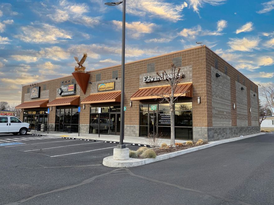 Fully leased commercial building in great Redmond location, next door to US Post Office.  Beautiful, well maintained building, easy ingress and egress, ample parking and drive through window. Four long term stable tenants.  Upside potential with current rents below market.  Redmond and neighborhood growth will increase housing density and area foot traffic.  47 unit apartment complex under construction one block away.  Air scrubbers and laminated glass recently installed.  Do not disturb tenants.  Do not talk to tenants regarding sale of property.