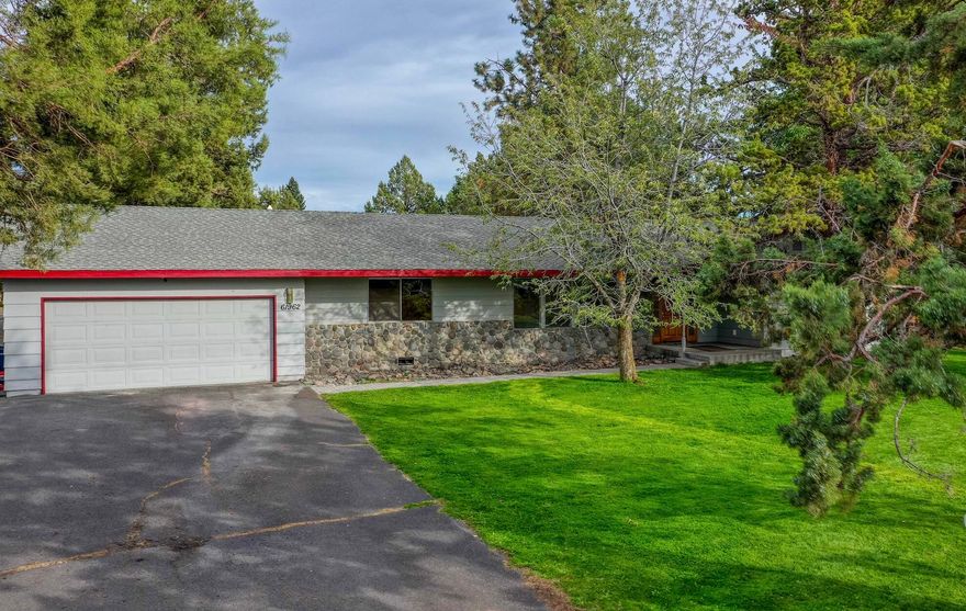 Single-level 4 bed, 2.5 bath home on a quiet SE Bend street, close to trails, shopping, and the Old Mill District. Bright, open floor plan connects the kitchen, dining, and living areas. The primary suite plus three additional bedrooms provide flexibility for family, guests, or office space. Backyard includes rare Bend irrigation rights and a versatile barn—ideal for hobbies, storage, or small business use. Whether you're seeking room to spread out, space for projects, or the ease of single-level living, this home offers it all.