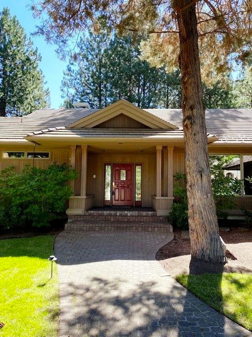 Absolutely stunning home and grounds await your arrival in the coveted gated Mountain High community.  This amazing custom home was designed by Van Sant and comes with an extra buildable landscaped and treed lot for privacy and visual enjoyment.  So many incredible custom features in this home to include: Custom wood floors, cabinets, shelving, vaulted ceilings. Spacious owners suite with 2 separate bathrooms , 2 large walk in closets with custom cabinets and shelving, gas fireplace, entrance to outside deck with hot tub. Gourmet kitchen with granite counter tops, subzero refrigerator, double ovens, gas range top, prep island with sink, larger island with sink and seating, eating nook and formal dining area, wood burning fireplace in vaulted family room,  living room with gas fireplace, 2 other bedrooms with Jack and Jill bathroom, a den/office area that is simply breath taking and a 3 car garage.  Pickleball, tennis and pool are also available for your enjoyment as HOA amenities.