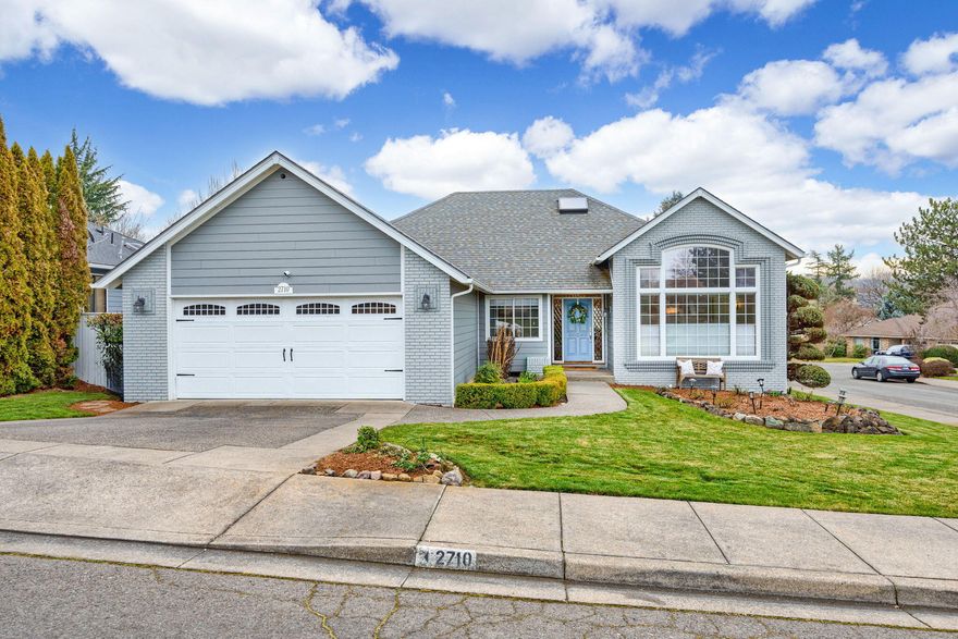 Beautiful single-level home in prime East Medford location near Lone Pine Elementary. Enjoy outdoor living with mature lush landscaping and a private backyard. Inside, vaulted ceilings and skylights enhance spaciousness and natural light. The kitchen features an oversized island, a new stove-top, and Tile & Corian counters. Relax by the wood-burning fireplace in the family room. Beautiful oak hardwood floors in main living areas. The primary suite offers a remodeled custom spa bathroom with dual sinks, a walk-in shower, and a large soaking tub. Recent updates include new bathroom plumbing, interior and exterior paint, Hardie board siding, rain gutters, new carpet, and a water heater. Garage with built-in cabinets. Welcome home! Buyer agrees to cooperate with Sellers 1031 Exchange