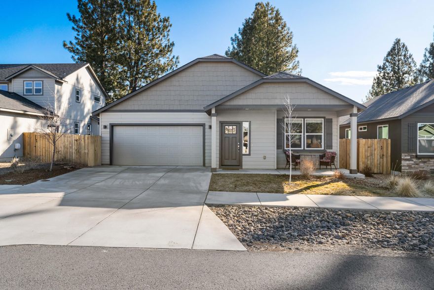 Experience the comfort of this single-level, 3-bedroom, 2-bathroom home in the sought-after McKenzie Meadows community in Sisters, Oregon. Built in 2021 by Hayden Homes, this modern residence features granite kitchen countertops, stainless steel appliances, and a cozy gas fireplace for chilly winter nights. Stay cool in the summer with efficient A/C and enjoy abundant natural light throughout. The west-facing, landscaped front yard adds curb appeal, while the low-maintenance, fenced backyard offers a peaceful retreat. Just minutes from downtown Sisters, you'll find shops, dining, and local culture at your fingertips. McKenzie Meadows also offers beautiful parks and paths to meander, making this a perfect place to call home.