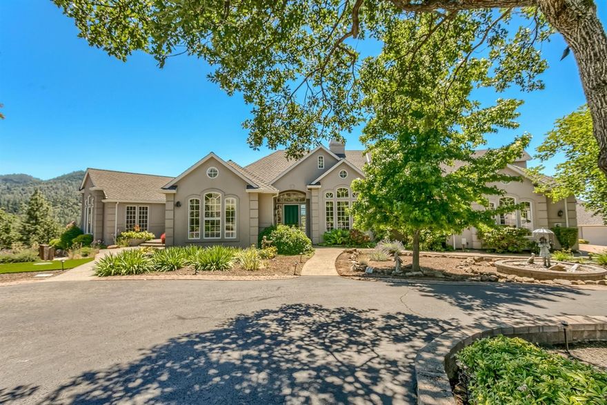 A shining STAR in Sun Ridge Estates this one owner home overlooks mountains, valley lights & all areas of Southern Oregon! Custom designed on 2.1 acres, 10-15 minutes from Medford, this Single Story 5664 sq ft home features expansive, uniquely windowed rooms w/views in all directions, 4 ensuites (or 3 w/mother-in-law qtrs.), office, both formal & informal living & dining rooms, butler's pantry, a kitchen w/island, fine appliances & everything a cook desires, laundry/sewing room, a game or exercise rm, a lg pool w/cover & pool house featuring a sauna, shower, bath & covered outdoor full kitchen. Immaculate and freshly painted. The master suite has his & her vanities and closets, jetted tub, dual shower heads, stackable W & DR & a secret closet w/safe. Attached 3 car gar & freestanding additional 2 car gar, totally fenced & security gated entry, immense patio areas w/stone from India, hot tub, bocce ball court, gazebos w/covers, outdoor fireplace & more. Truly a special property!
