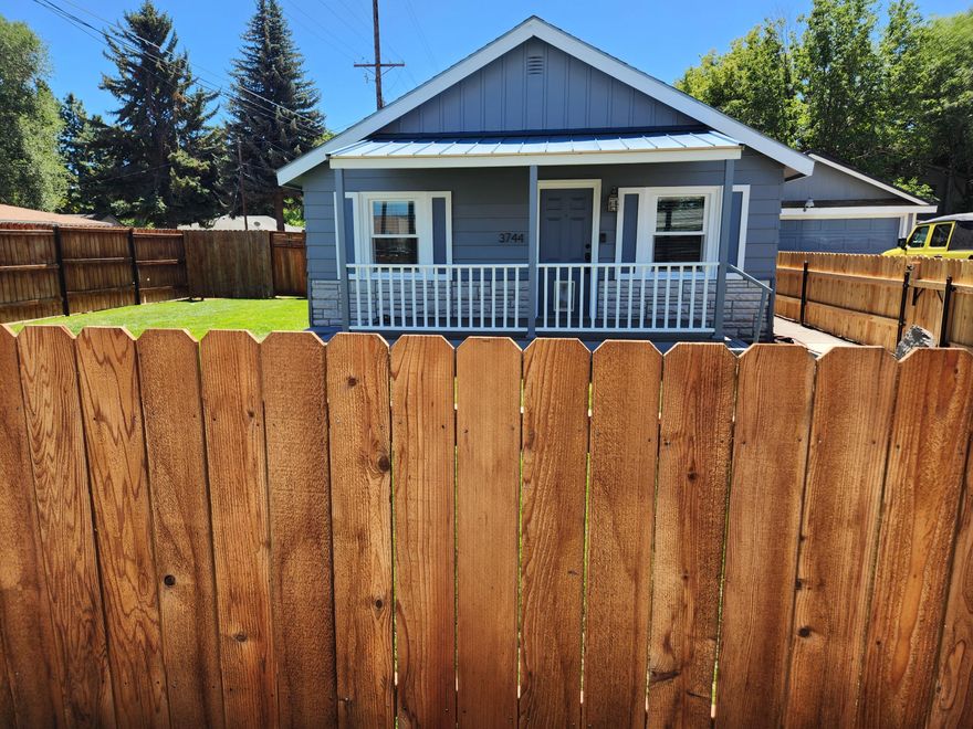 This home is move in ready. Remodeled kitchen with new cabinets, paint, fixtures, built-in dishwasher, microwave, flooring.  Plenty of storage space with the pantry.  The home has been completely painted inside and outside. New vinyl flooring and carpet  throughout the house.  Primary bedroom and bathroom have been remodeled as well. Walk-in closets. Tankless water heater. Two offices/storage/craft room/sewing room in the oversized garage.  The garage has ample storage space above in the loft and plenty of room for two cars.  New fencing around the property. New gates.  Two decks in the backyard for entertainment or just relaxing. Extra shed on the side of the garage that will fit a small trailer or boat. RV parking on the side of the driveway.