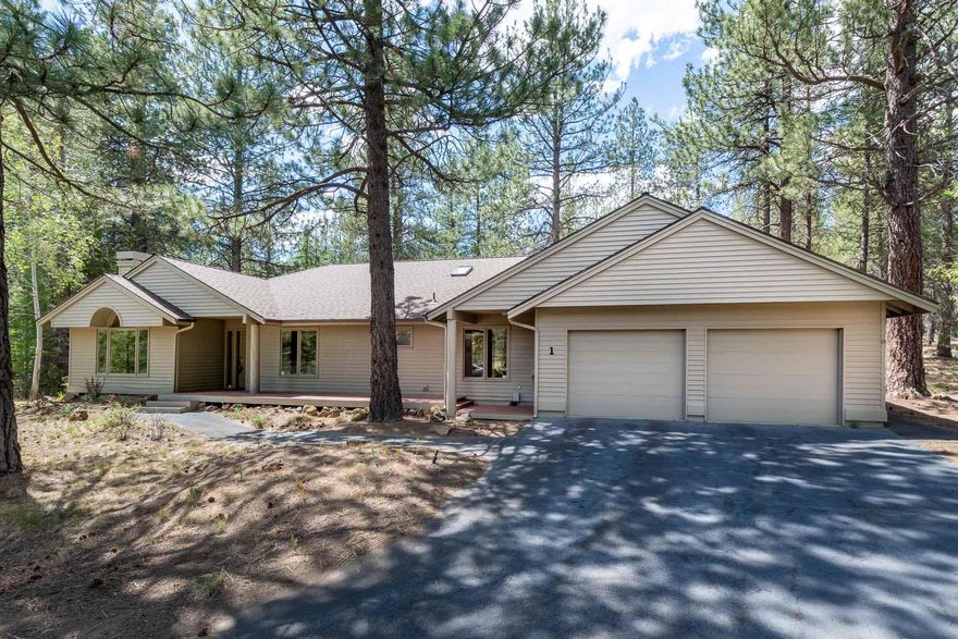 First time on the market in 21 years! This is an EXCEPTIONAL & rare location in Sunriver.  Located on a large 1/3-acre lot that back to a common area! If you are looking for some space, this is the spot for you! Single level living w/ 3 bedrooms & 2 baths plus a bonus solarium/sunroom area that is prefect for an office space/reading area/extra sleeping space & hot tub. This space offers cedar accented ceilings & skylights. Granite counters in the kitchen w/ an open flow for easy meal prep. There is an eating bar for the more casual dining or overflow needs. Wet bar & built in cabinets off the dining area.  Wood burning fireplace for those cool evenings! Great partially covered outdoor space to enjoy the wildlife & scenery. The tandem garage is approx. 850 sq. ft.  & can fit 4 smaller vehicles or a combo of cars and recreational vehicles. Sink & work bench w/ cabinets.  Convenient access to the bike path and the SHARC & Village are just a short distance.  Furnished. SHARC paid in full.