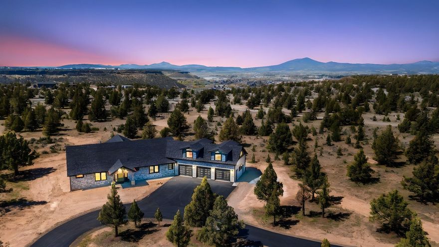 MOVE IN READY! Rare opportunity to own a home nestled in the prestigious, gated community of Grandridge on 16 level acres w/room for shop & barn!  Quality construction is evident everywhere you look! Entire driveway to be paved all the way to garage doors in May.  400-amp service. Less than 5 minutes from town, this magnificent 3,700 sqft home offers 4 beds (1 is perfect for an office w/barn doors), 3.5 baths, &  built-in fire suppression system. Property offers ample space, & storage throughout. Expansive 3 car garage & generous laundry room. The inviting fireplaces in the living room & larger primary suite, add warmth & character. Culinary enthusiasts will delight in the chef's kitchen,  w/ 48' dual-fuel range w/6-burner cooktop with griddle, dual temp beverage fridge & large island. Spacious bonus room upstairs w/ wet bar, beverage cooler & 1/2 bath. HOA & road maintenance fees total $600/yr. Smart-home wired & security camera ready. Equipped with high speed, fiber optic cable.