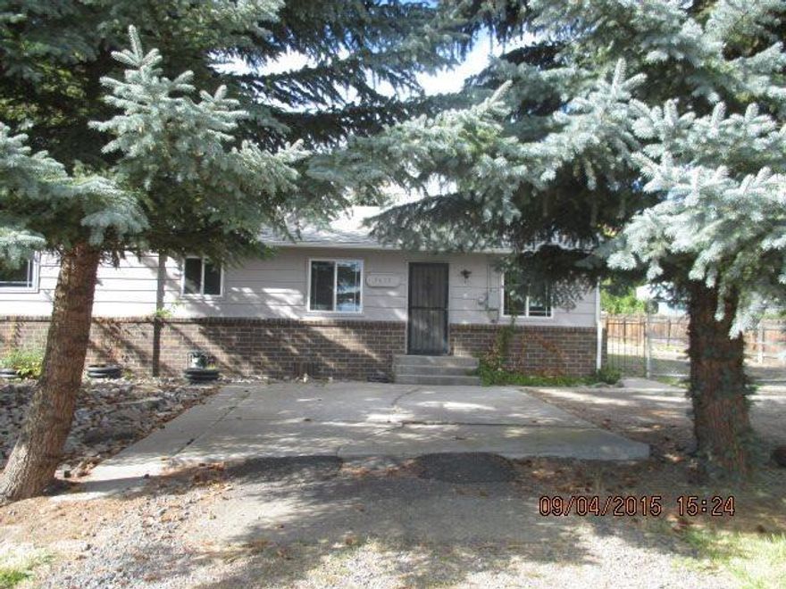 Don't Miss Out On This Great Opportunity In The Suburbs!! Over 1400 Sq Ft Of Living Space Situated On A Large .44 Acre Lot, Fenced With Shop Building And Plenty Of Room Gardening Or Other Hobbies.