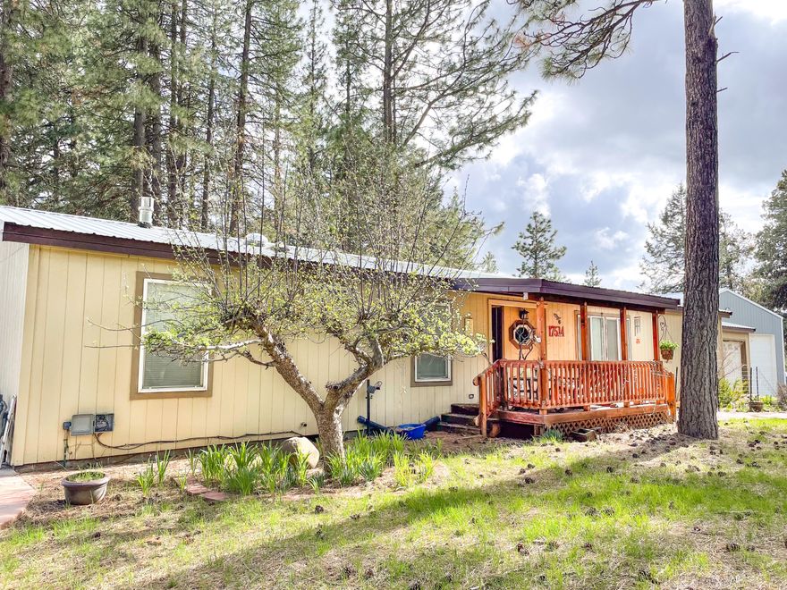 Over 3 acres with a heated shop. There's so much to love about this property, this home features a warm, welcoming interior with a large open floor plan. Updated kitchen, well maintained, main bathroom has double sinks. The deck and patio create a tranquil backyard with plenty of privacy. Adding to the homes appeal there is a large heated shop with both RV and garage doors. New septic tank installed in July 2023.