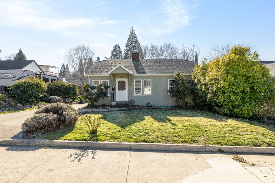 Nestled in a desirable Old East Medford neighborhood, 1414 Euclid Ave is a charming cottage-style home that offers a perfect blend of vintage character and modern updates. This cozy 3-bedroom, 1-bathroom residence features a spacious living area filled with natural light, a recently updated kitchen and a large backyard that offers a great spot for outdoor entertaining or gardening. The detached garage comes with an additional workshop, providing extra storage or space for hobbies.

This home is just minutes away from downtown Medford, offering easy access to shopping, dining, and entertainment, while maintaining a peaceful neighborhood vibe. Whether you're a first-time homebuyer or looking for a cozy retreat, 1414 Euclid Ave is the perfect place to call home.

Don't miss out on this opportunity to own a piece of Medford's charm. Schedule a tour today!
Listing broker is related to seller.