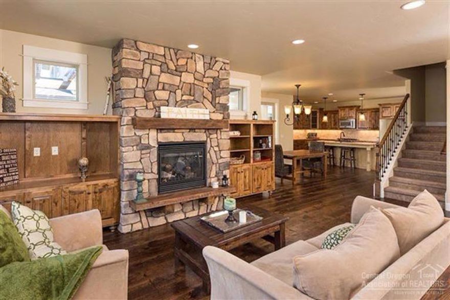 Breathtaking new home with mountain views in the friendly RiverRim community! 5 beds & 3-car garage! Full bed & bath downstairs! Walk to local market & coffee shop or enjoy a drink on the private outdoor living space. Attention to detail in every corner; from barn wood hearth & mantle to the hand lathed wall texture to the custom corbels under exterior eves. Tile showers, custom light fixtures, rough-edge granite countertops, under-mount sinks, A/C and more!