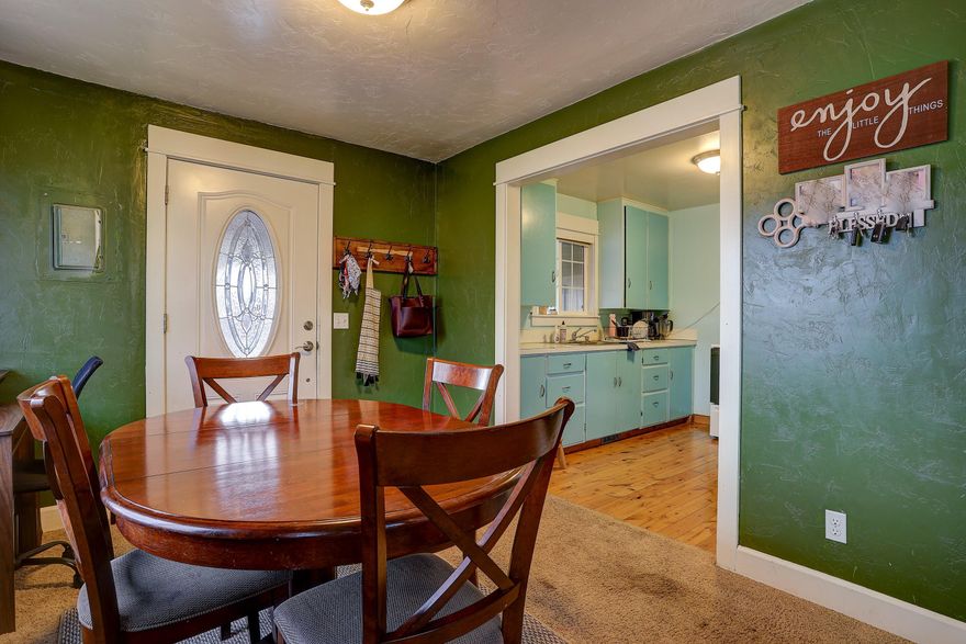 Perfect opportunity for an investor or first time home buyer.  Adorable 928 sf 2 bedroom 1 bath is located in the heart of Culver. This home has a large open kitchen w/ original hardwood floors, dining area, living room w/ wood burning fireplace, spacious bedrooms & bath, laundry / storage enclosed room off of the covered carport. Call for your showing today!