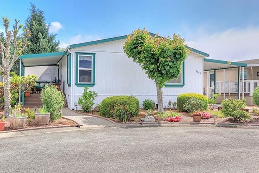 Soaring ceilings and a split floor plan with an open airy feel make this a home you'll enjoy every day. There's a great deck for outdoor relaxation, an easy to maintain yard space, and good neighbors all located in a clean, quiet 55+ park. Buyers must be approved by park management prior to closing. Monthly rent is $ 535 and it includes water, sewer and garbage.