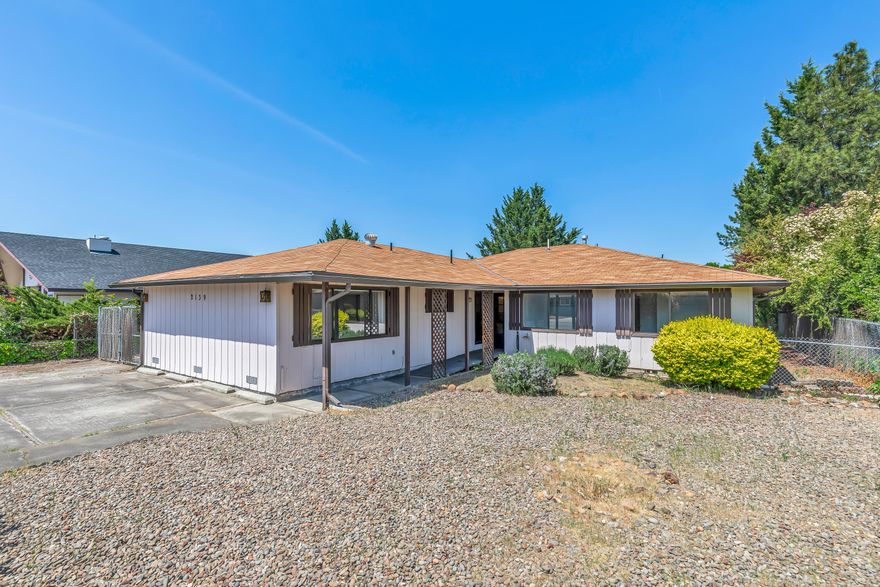 This spacious 2,596 sq ft home offers exceptional flexibility with 6 potentially 7 bedrooms and 4 full bathrooms, making it well-suited for large households, multi-generational living, or investment purposes. The interior has been freshly painted and there are vaulted ceilings in the main living area. The layout offers a range of possibilities all in a convenient East Medford location. With acceptable offer seller is willing to contribute $15,000 towards a roof replacement at closing and provide a 1 year home warranty of buyers choice up to $600.