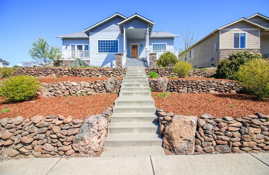 Imagine sitting on the front porch, watching a thunderstorm roll in or a gorgeous sunset, in this beautiful home in Eagle Point's Barton Estates! Three bedroom, two bath home with a desirable split floor plan. As you enter into the open living area, you'll immediately notice the spectacular views of the south valley and mountains. The kitchen has an island and lots of cabinets, as well as a large walk-in pantry in the utility room. This is the perfect home for entertaining! The spacious Master Bedroom has a private balcony with more of those amazing views. The remaining 2 bedrooms are roomy and light. The garage is accessed from the alley in the rear of the home. Very close to Eagle Rock Elementary, EP Middle School and EP High School! This home was built Earth Advantage, to help reduce heating and cooling costs. Call for a tour today!