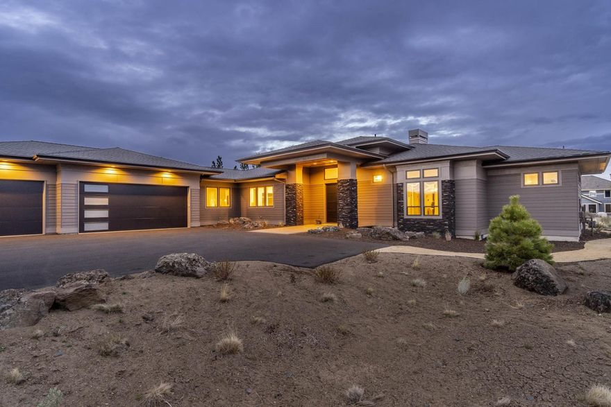 Welcome home to this luxe yet livable home, built by award-winning Builder Dave Hasenoehrl. A beautiful entryway greets you as you enter through double doors. Wide-plank European white oak floors flow throughout the living areas, w/ lush carpet in the bds. In the great rm, find a vaulted ceiling, soaring windows, & gas FP. Take in the views from the thoughtfully laid out gourmet kitchen, featuring a large island, Thermador/Bosch applcs, bev. fridge, & pantry. In the owner's suite, tall windows & glass door to the patio usher in sunlight. In main bath, enjoy a curbless w/i shower, soaking tub, & access to the w/i closet w/ built-ins. On the other end of the home, two more bds are both full suites. All bds include blackout blinds & all blinds in home are automatic w/ smart capabilities. Behind the home, a paver stone patio is partially covered & is plumbed for a gas firepit. This home also boasts an outdoor hot tub, dedicated office, large mud/laundry rm, & 3-car garage w/ storage.