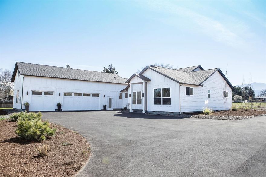 This beautiful new 2979 square foot home centrally located on 1.95 acres built by Cota Homes LLC and they thought of everything! This home has a very light and bright feel with an open floorplan that was designed for entertaining. The kitchen is spacious with a large concrete island, custom cabinets, bar seating, a gas range w/ double ovens, full separate refrigerator and freezer, a large butler pantry that has tons of storage, its own sink, and even more counter space! The great room has a beautiful modern fireplace with large windows that showcase the amazing view of the surrounding mountains. The master suite has a spa style walk-in shower with his and her sinks and walk-in closets! It features a split floor plan with 4 bedrooms, 2 and half baths, a large great room, and office space upstairs. It has an oversized 3 car garage and well house with extra storage for your toys or mower. Property features, EFU zoning, TID water, 38/gal/min artesian well, and a large paved driveway.